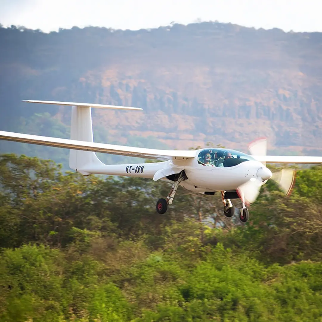Power glider over Aamby Valley City